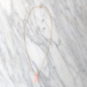 Gold plated necklace with pink crystal